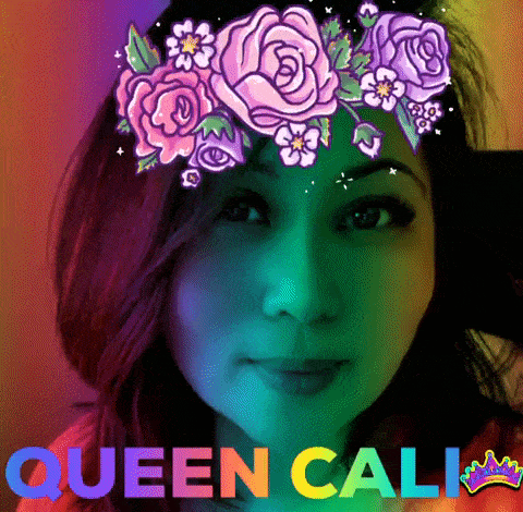 a woman with a flower crown on her head and the words queen cali on her face
