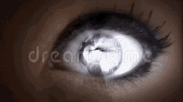 a woman 's eye with a globe in it .