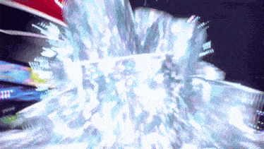 a computer generated image of a glowing explosion