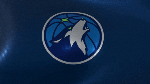 a logo for the minnesota timberwolves with a wolf howling