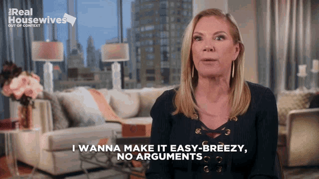 a woman says " i wanna make it easy breezy no arguments " in front of a living room