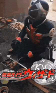 a person in a superhero costume is sitting at a table