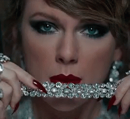 Taylor Swift Bite GIF - Taylor Swift Bite Biting Diamonds GIFs