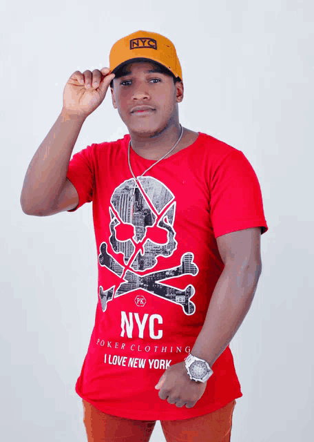 a man wearing a red shirt that says nyc