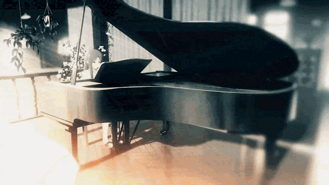 a black grand piano with the lid open in a dark room