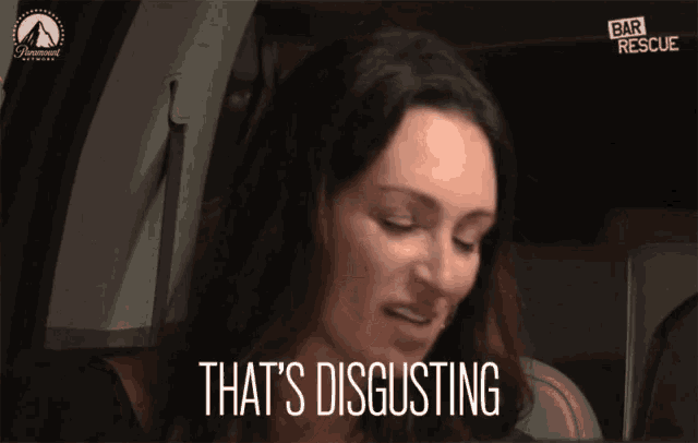 a woman in a car with the words that 's disgusting on her face