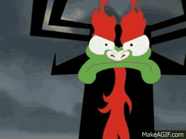a cartoon character with a green face and red horns .