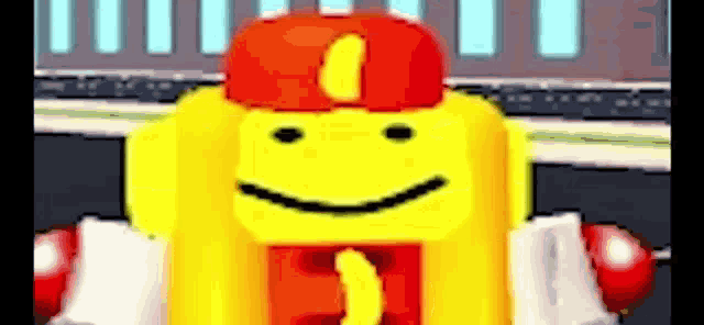 a yellow cartoon character wearing a red hat and a banana on his chest .