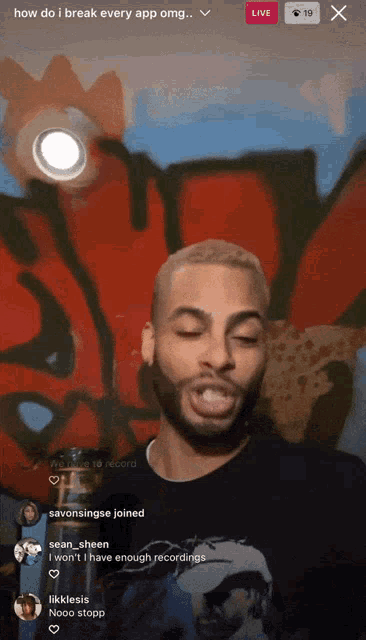 a man with a beard is on a live stream talking about how he breaks every app