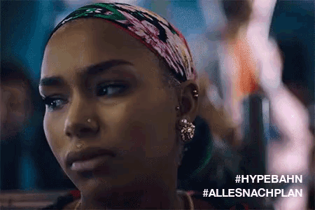 a close up of a woman 's face with the words #hypebahn #allesnachplan below it
