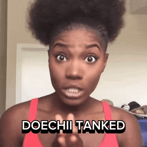 a woman says doechii tanked in black letters