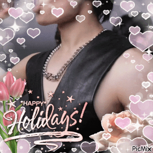 a picture of a man surrounded by pink hearts and the words " happy holidays "