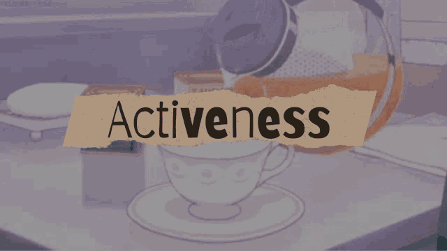 the word activeness is on a piece of paper next to a cup