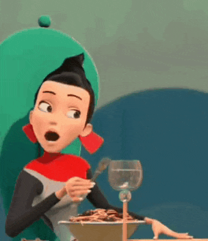 a cartoon character is sitting at a table with a bowl of food and a glass .