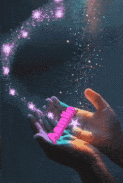 a person holding a pink heart in their hands with the word love coming out of it