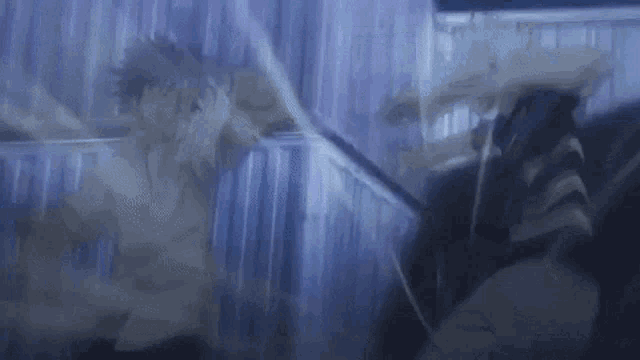 two anime characters are fighting each other in a dark room