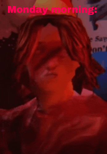 a man with long red hair is wearing a red shirt and a red hat with the words monday morning below him