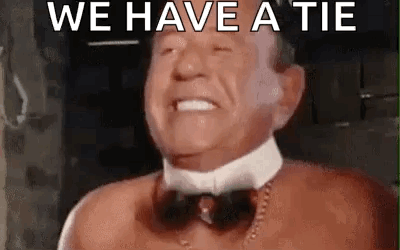 Frank Butcher Spinning GIF - Frank Butcher Spinning Bow Tie GIFs