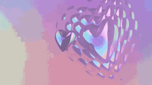 a purple and pink background with a heart shaped object