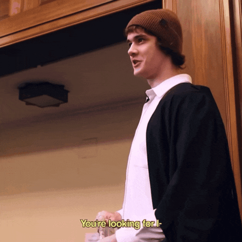 a man in a cape says " you 're looking for j. "