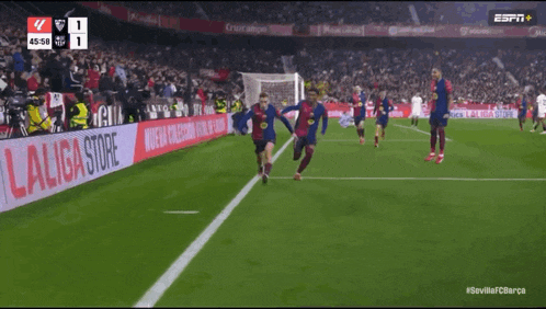 a soccer game is being played and the score is 1 to 1