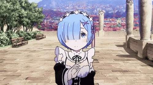 rem from re zero starting life in another world is standing on a brick sidewalk .