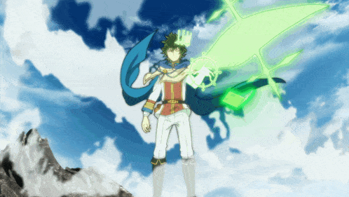 a man with a blue scarf around his neck is holding a green object