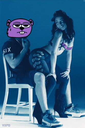 a man in a black shirt with the number six on it sits next to a woman in a bikini