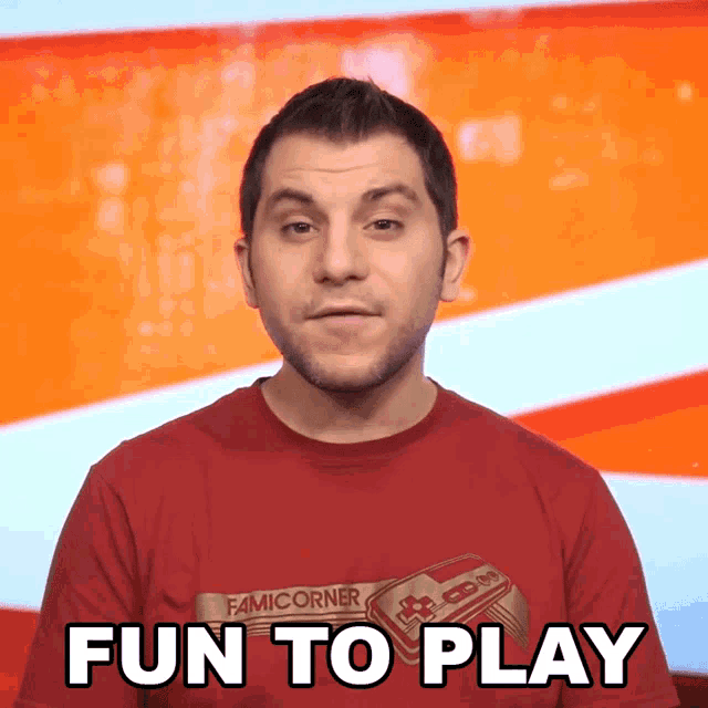 a man wearing a red shirt that says famicorner on it