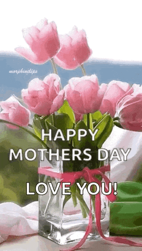 a vase filled with pink flowers with the words `` happy mother 's day love you '' written on it .