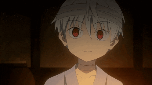 a young boy with a bandage on his head has red eyes