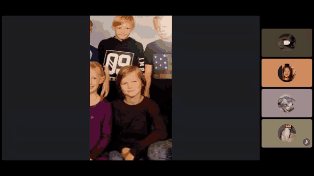 a group of children are posing for a picture with one wearing a shirt with the number 90 on it