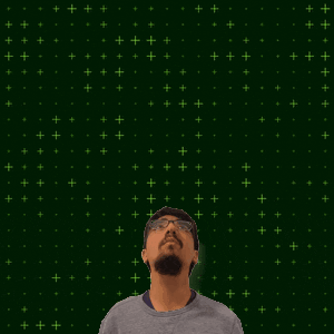 a man stands in front of a green background with the number 15