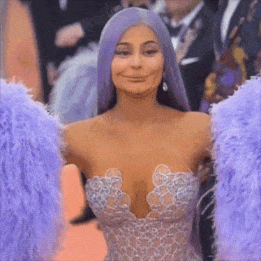 a woman with purple hair is wearing a very revealing dress