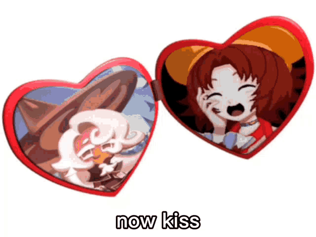a red heart shaped mirror with a picture of a girl and a man and the words now kiss below it