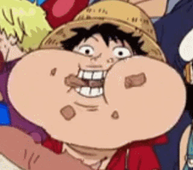 a close up of a cartoon character 's face with a big mouth .