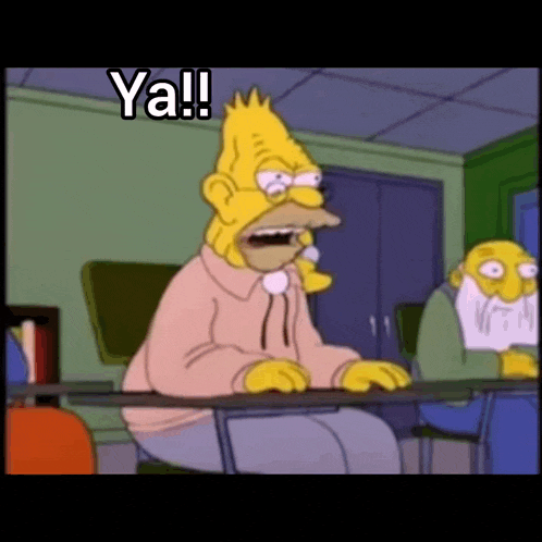 bart simpson is sitting at a desk with his mouth open and says ya !