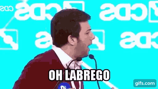 a man is giving a speech at a podium and saying oh labrego .