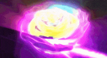 a close up of a person holding a glowing object in their hand .