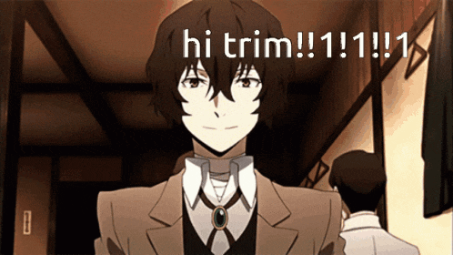 a man in a suit is smiling and says hi trim