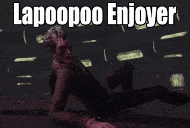 a picture of a man laying on the ground with the words lapoooo enjoyer
