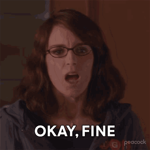 a woman wearing glasses says okay fine in front of a peacock logo