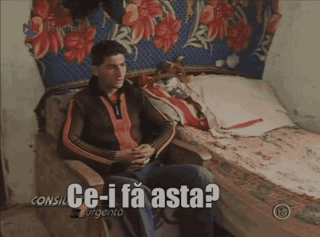 a man is sitting in a chair with the words ce-i fa asta