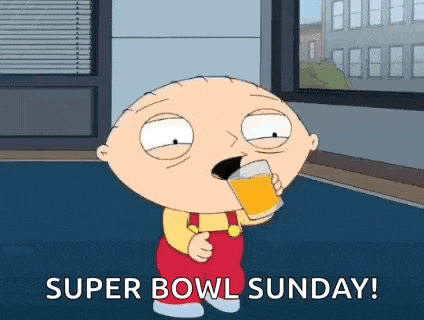 stewie from family guy is drinking a glass of orange juice on super bowl sunday .