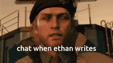 a man in a beret with the words chat when ethan writes on his face