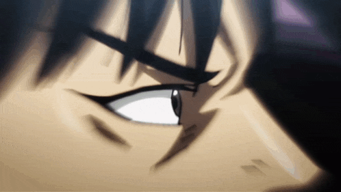 a close up of a person 's eye with a very angry expression