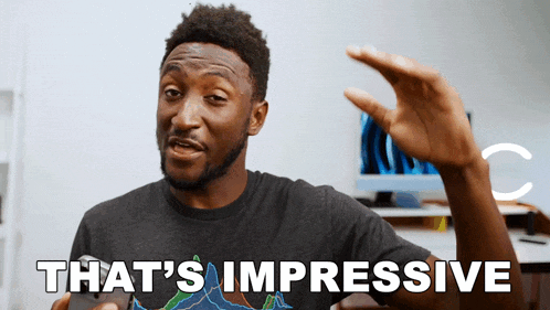 a man wearing a t-shirt that says " that 's impressive "
