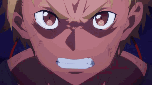 a close up of a person 's face with an angry look on his face
