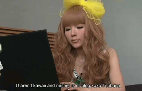 a woman with a yellow bow on her head is using a laptop computer
