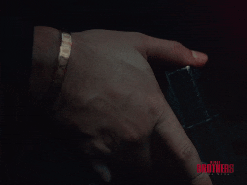 a close up of a person 's hand with the words blood brothers canada on the bottom right